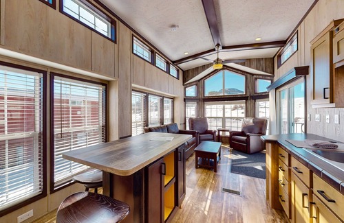 Colorado Springs Cottage | Sunlit cabin on 1,800-acre ranch with animals, mountains, games & firepit