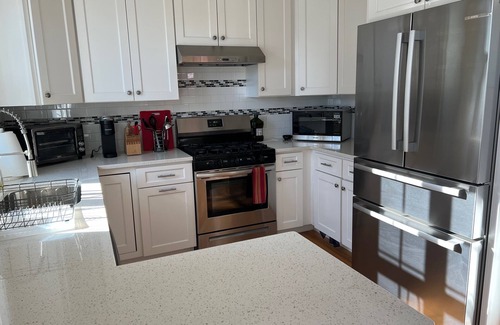 Watertown House | Sunny 2 BR townhouse near Charles. Bus/bike to Harvard, MIT, fin. distr. Dogs ok