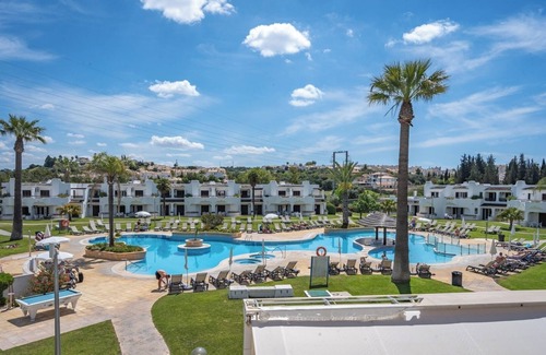 Alpouvar Apartment | Sunny Flat with a Balcony and Pool by HostWise