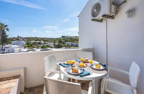 Alpouvar Apartment | Sunny Flat with a Balcony and Pool by HostWise
