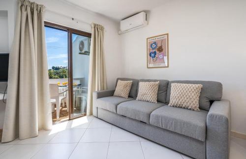 Alpouvar Apartment | Sunny Flat with a Balcony & Pool by HostWise