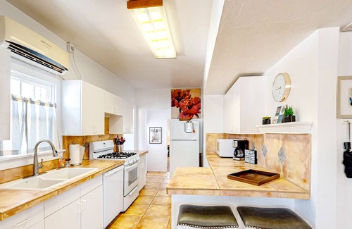 Blenman-Elm House | Sunny home with old-school charm, fireplace, grill, & covered patio - dogs ok