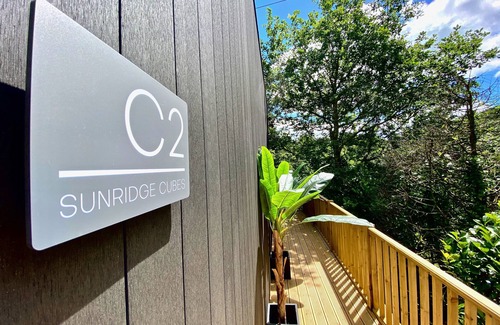 Newton Ferrers Cabin | Sunridge Cube 2 with Hot Tub & Giant Home Cinema
