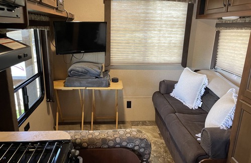 Dandridge RV Rental | Sunset Seeker is a cozy camper with a beautiful view of Lake Douglas!