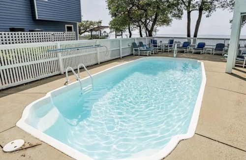 Corolla Light House | Sunset Views! Waterfront in Corolla Light. Pool, Hot Tub. Dog Friendly. Elevator