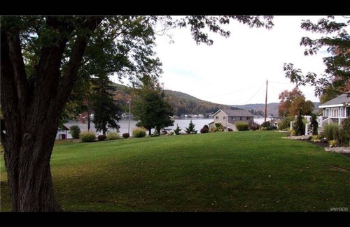 Cuba House | Sunsets & Skiing- Lake Front Rental House on Cuba Lake