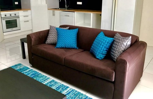 Portsmith Apartment | Sunshine Retreat with Large Lagoon Pool