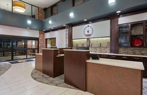Conrad Hotel | Super 8 by Wyndham Conrad