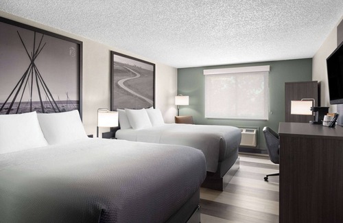 Conrad Hotel | Super 8 by Wyndham Conrad