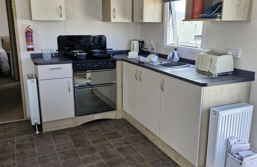 Kessingland House | Superb 8 berth caravan with decking at Kessingland Beach ref 90018BV