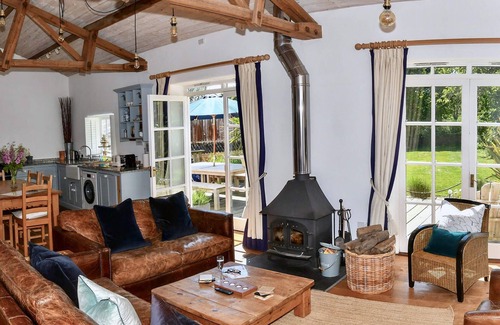 Ottery St Mary House | Superb detached Grade II listed barn conversion with private hot tub, close to coast