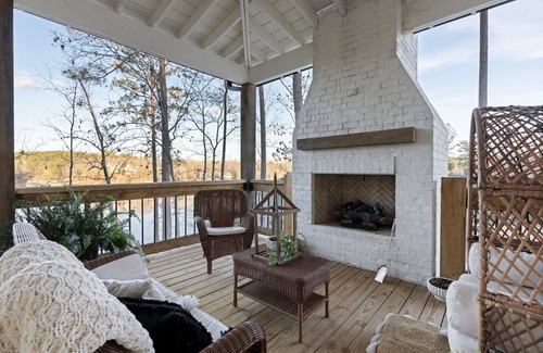 Houston House | Surfing on Smith Lake ~ family-friendly & pet friendly lakehouse with hot tub