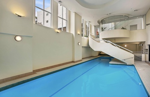 Surry Hills Apartment | Surry Hills- SHIL5 - Campbell Street - Stylish 1BR Warehouse Apartment with Balcony City Views in The Carlisle, Surry Hills