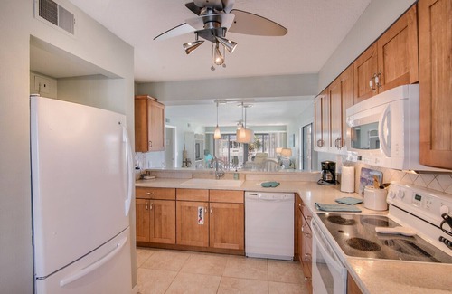 Cocoa Beach Condo | Sweet Cocoa Beach Remodeled Retreat ~ Heated Pool, Spa ~ 2 Sunny Balconies