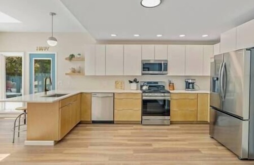 Norton Shores House | Swimming in the Woods