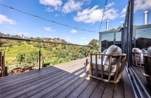 Hepburn Cottage | Teetering over a ravine, with a petrified stone bath older than the dinosaurs
