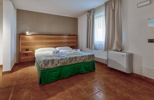 Civitavecchia Bed & Breakfast | Tenuta dell'Argento - Room 3 by Rentbeat
