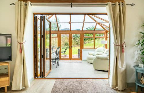 Monksilver House | The Barn at Burfords with wood fired hot tub