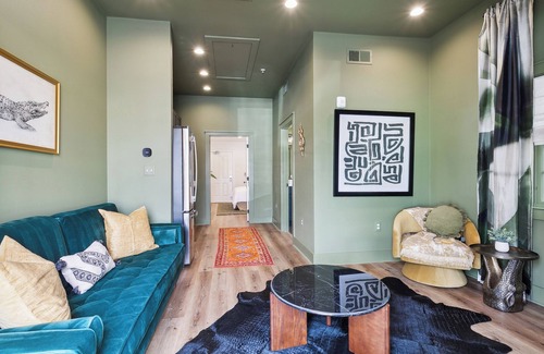 New Orleans Hotel | The Bayou Room at Faubourg Orleans. Queen Suite with living area and kitchenette