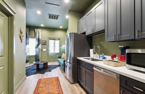 New Orleans Hotel | The Bayou Room at Faubourg Orleans. Queen Suite with living area and kitchenette