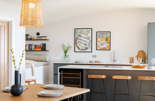 Widemouth Bay House | The Beacon is a five bedroomed terraced seafront retreat with incredible views of Widemouth Bay. It
