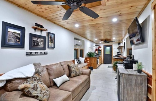 Baird House | The Belle Plain Caboose is a private romatic stay with great fishing!