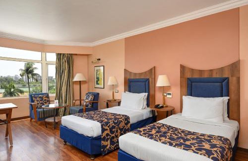 Ahmedabad City Centre Hotel | The Cama - A Sabarmati Riverfront Hotel
