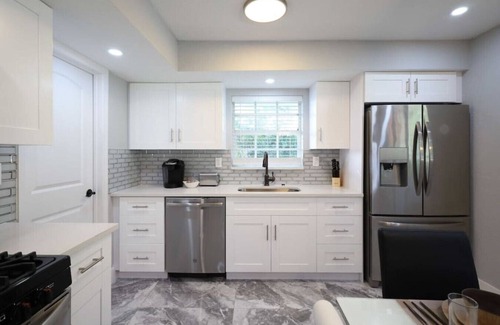 West Palm Beach Villa | The Coral Villa - Heated Pool Spa and Lush Garden