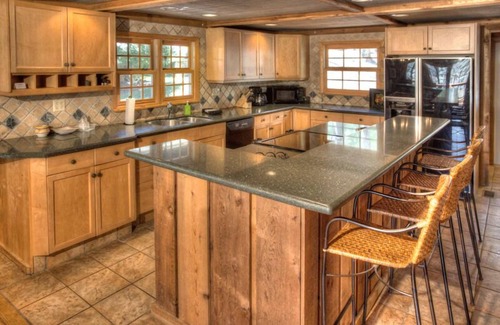 Clarkesville House | The Cove at Lake Burton | Vintage Lakefront Home with Covered Boathouse Deck