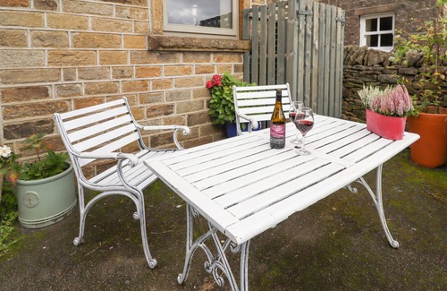 Holmfirth Cottage | THE COW SHED, with open fire in Holme, Yorkshire