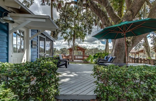 Lemon Bluff Cottage | The Cozy Euphoric cottage nestled in nature with relaxing River front views.