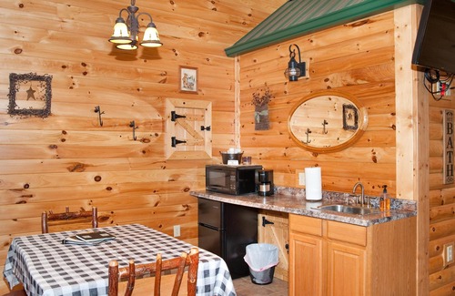Flintstone Ski Chalet | The double cabin has 2 queen beds, 1 king bed, 1 sleep sofa for 1 child. Cabin has common porch and each unit has a private entrance.