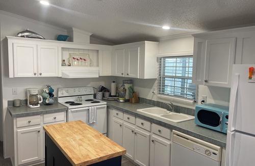 Flamingo Bay House | The Flamingo at Sandpiper 2 bed 2 bath waterfront location with dock and lift
