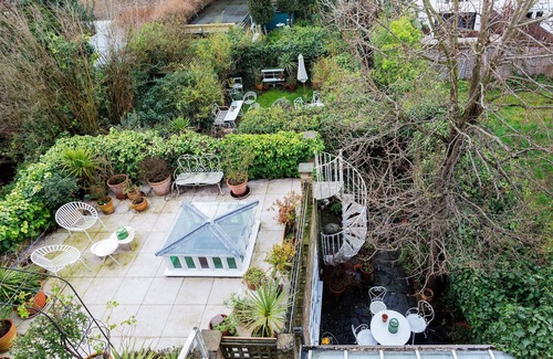 West Hampstead Apartment | The Garden Glade, by Veeve