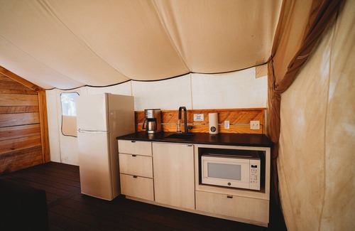 Shell Knob Cottage | The Henry Glamping Tent with Boat Dock at Rod N Reel Resort