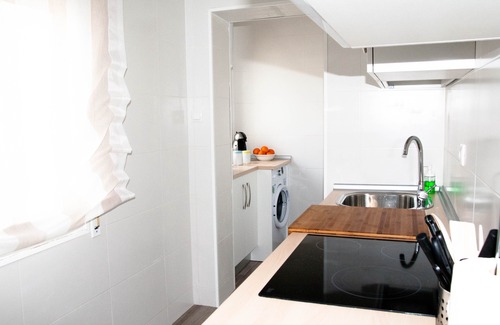 Distrito Centro Apartment | The House of the Wall