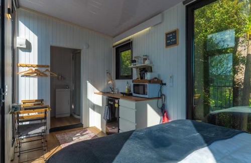 Waitoki House | The Kauri Haven by Tiny Away
