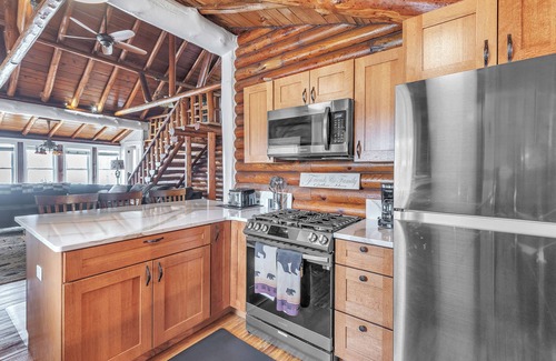 Gladwin Cabin | The Log Weekend: Cozy Up for a Crisp, Colorful Lakeside Escape