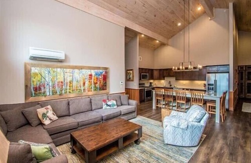 North Conway Condo | The Luxurious Penthouse Ski-in/Ski-out Kearsarge Brook Condo at Cranmore Mtn!