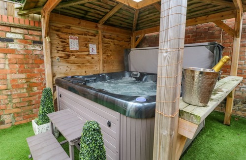 Leven House | THE OLD WAGON SHED, pet friendly, with hot tub in Leven Near Beverley