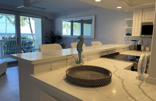 Deerfield Beach Condo | THE ONE! NEWLY RENOVATED GROUNDFLOOR BEACH/OCEAN FRONT CONDO with private deck!