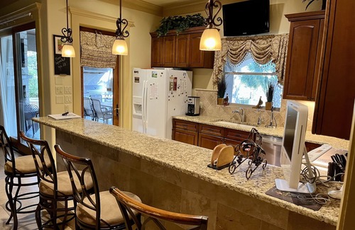Comanche Trail House | The Palms - Waterfront with Dock/Near Oasis/Close to town/Pool Table/Hot Tub