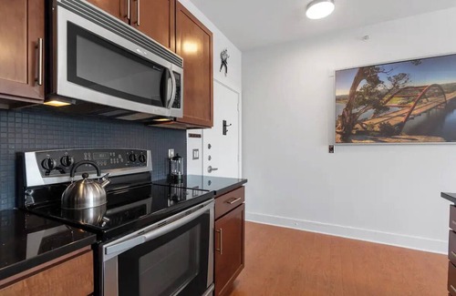 North University Condo | The Presley - Elvis Themed Downtown Loft. Skyline &Tower Views-close to it all