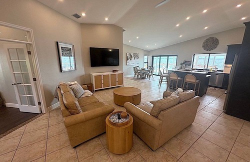Caloosahatchee House | The River View 1008 - SE Cape Coral Riverfront Luxury Pool Home Pool Table and more