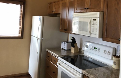 Baileys Harbor Condo | The Rushes 3BR Condo with Fireplace & Lakefront Views