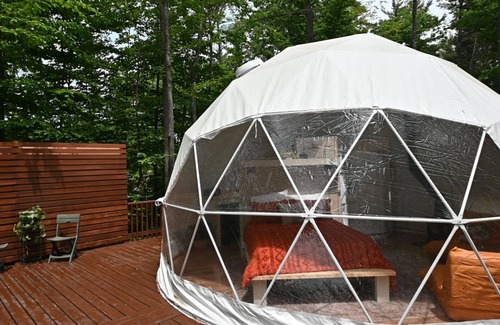 Sutton House | The Sanctuary Dome at Pine Hills Tree Farm nestled privately in the woods of NH