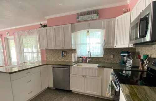 Redington Beach Cottage | The Seaside Getaway a Retro Coastal Cottage.