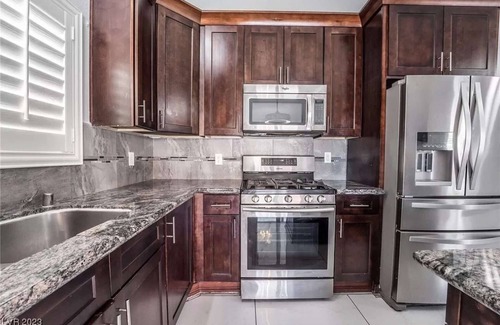Las Vegas House | The Stone Sanctuary Northwest: Heated* Pool, Projector, Arcade Game, Billiards, Family Park Adjacent