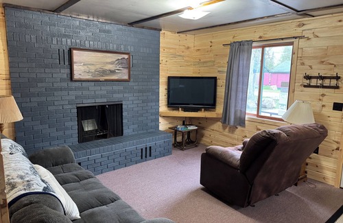 Gould City Cabin | The Wolf Den at Sunset Pines Resort