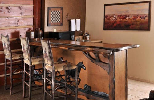 St. Joseph Hotel | Theme Suite Whirlpool, Stoney Creek, Living Room and Hot Tub | 2 Units